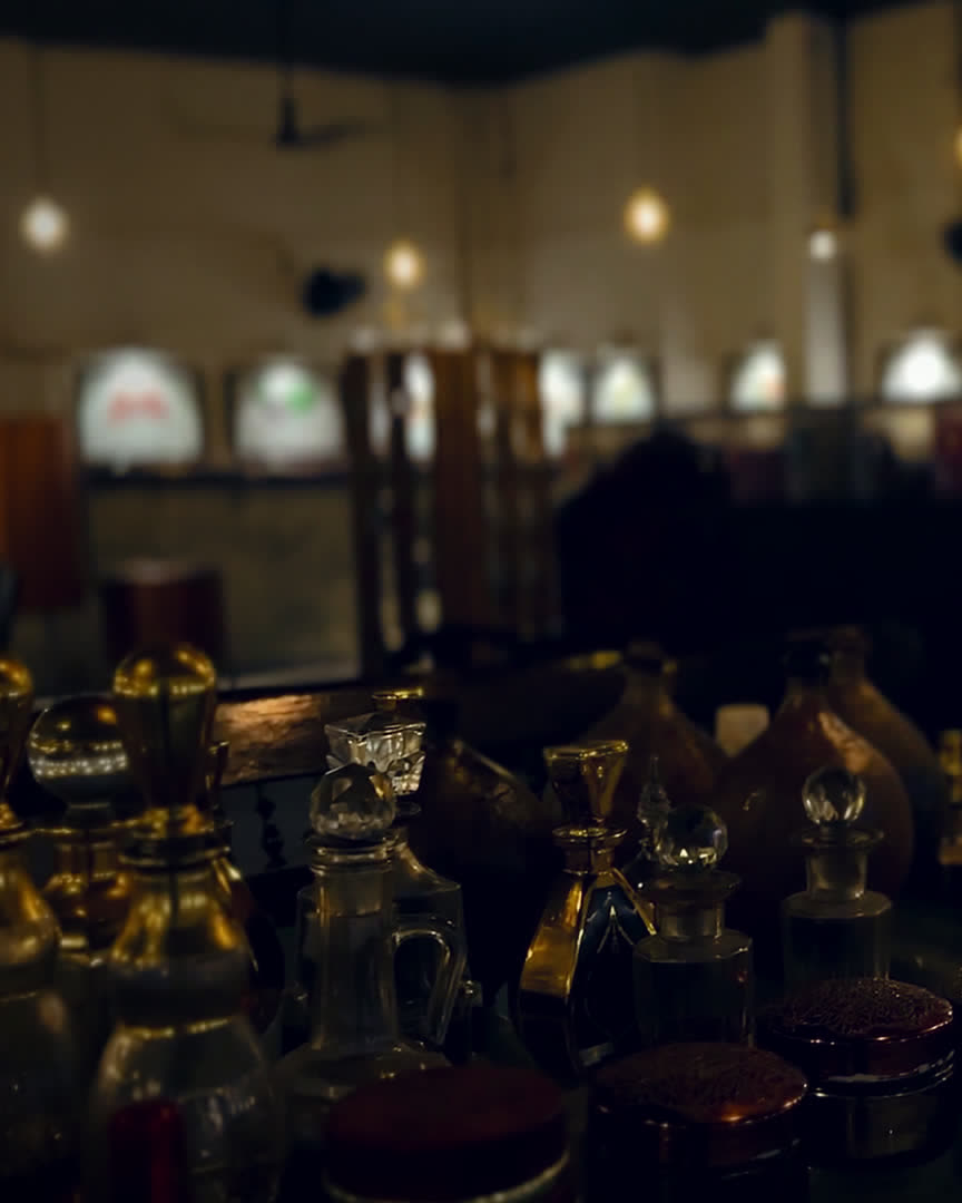 Amber glass oil bottles with crystal stoppers at the SPR Perfume Museum, Mattancherry