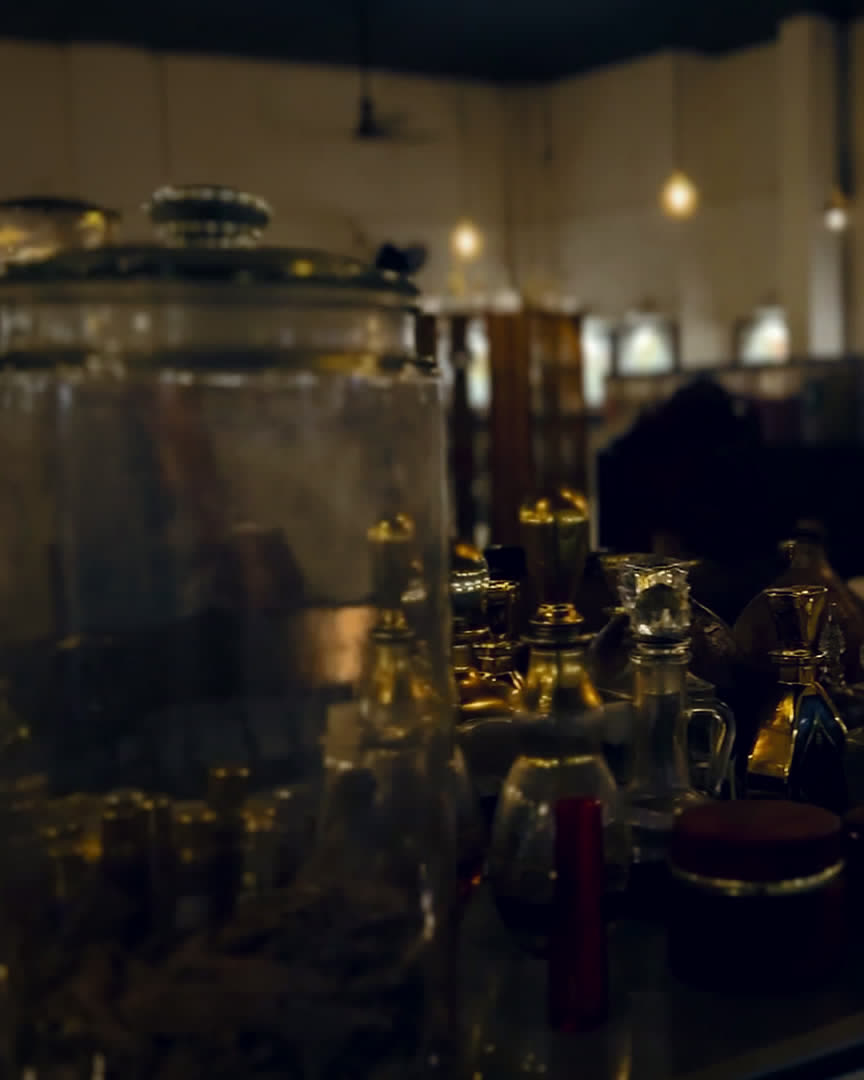 Antique glass perfume bottles at the SPR Perfume Museum, Mattancherry